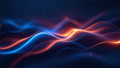 The primary subject of the image is a blue and orange wave, which appears to be a digital art or illustration. The setting is a dark background, and the visual style gives the impression of a futuristic or abstract design. The dominant colors in the image are blue and orange, creating a vibrant and dynamic atmosphere.