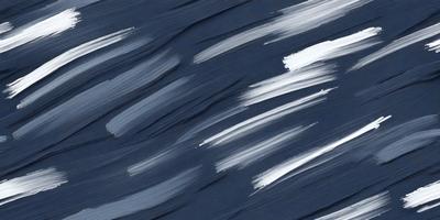 The primary subject of the image is a blue background with white streaks. The setting appears to be a painting or drawing, as the background is not a natural environment. The visual style is artistic, with the white streaks creating a unique pattern on the blue surface. The colors and mood of the image are predominantly blue and white, giving it a calm and serene atmosphere.