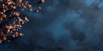 The primary subject of the image is a blue background with a few white flowers scattered across it. The setting appears to be a dark room, and the visual style is a combination of a photo and a painting. The dominant colors are blue and white, creating a calm and serene atmosphere.