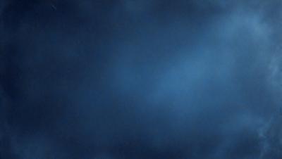 The primary subject of the image is a blue sky with clouds. The setting is a cloudy day, and the visual style is a photo. The dominant colors are blue and white, creating a calm and serene atmosphere.
