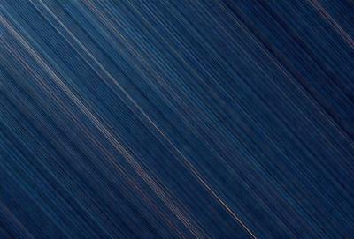 The primary subject of the image is a blue background with a pattern of lines or stripes. The setting appears to be a night sky, with the background being dark and the lines or stripes creating a visually striking pattern. The visual style of the image is a combination of a photo and a digital art or illustration, as the lines or stripes are created through a digital medium. The colors and mood of the image are predominantly dark and moody, with the blue background and the lines or stripes creating a sense of