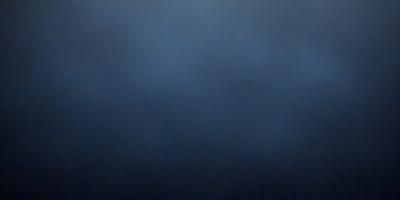 The primary subject of the image is a dark blue sky with no clouds. The setting is a vast, open space with no visible landmarks or objects. The visual style is a simple, monochromatic image with no additional elements or textures. The colors and mood of the image are predominantly dark and moody, creating a sense of emptiness and vastness.