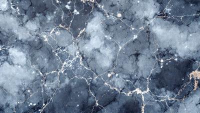 The primary subject of the image is a close-up of a marble wall with a blue and white color scheme. The setting is a stone wall, and the visual style is a photo. The dominant colors are blue and white, creating a calm and serene atmosphere.