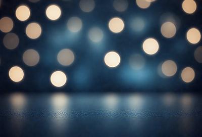 The primary subject of the image is a blue background with a pattern of white lights. The setting appears to be a dark room, and the visual style is a digital art or illustration. The dominant colors are blue and white, creating a calm and serene atmosphere.