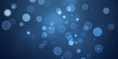 The primary subject of the image is a blue background with a pattern of white dots. The setting appears to be a night sky, with the dots creating a star-like effect. The visual style is a combination of a photo and digital art, as the dots are arranged in a way that resembles a painting. The colors and mood of the image are predominantly blue and dark, creating a sense of depth and mystery.