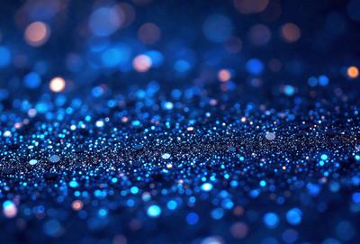 The primary subject of the image is a blue background with a pattern of blue and white stars. The setting is a dark, starry night, and the visual style is a digital art or illustration. The colors and mood of the image are predominantly blue, creating a serene and peaceful atmosphere.