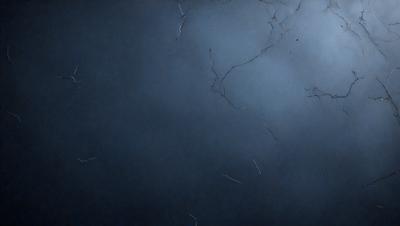The primary subject of the image is a blue wall with a few white lines on it. The setting is a dark room, and the visual style appears to be a photo. The dominant colors are blue and white, creating a calm and serene atmosphere.