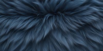 The primary subject of the image is a blue, furry, and fluffy object, which appears to be a piece of fabric or a stuffed animal. The setting is a blue background, which complements the blue color of the object. The visual style is a close-up of the blue furry object, showcasing its texture and details. The colors and mood of the image are predominantly blue, creating a calm and soothing atmosphere.