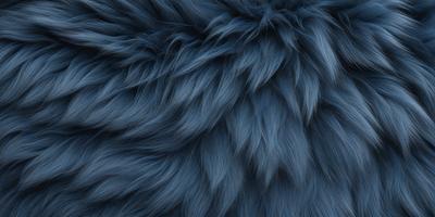 The primary subject of the image is a blue, furry, and fluffy object, which appears to be a piece of fabric or a textured surface. The setting is a dark background, which contrasts with the blue fabric. The visual style is a close-up of the blue fabric, showcasing its texture and color. The colors and mood of the image are predominantly blue, creating a calm and serene atmosphere.