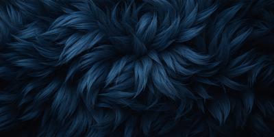 The primary subject of the image is a blue, furry, and textured object. The setting is a dark blue background, which contrasts with the blue fur. The visual style appears to be a close-up of the furry object, possibly a digital art or illustration. The colors and mood of the image are predominantly dark blue, creating a moody and mysterious atmosphere.