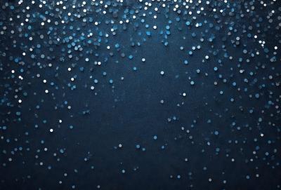 The primary subject of the image is a blue background with a pattern of white dots. The setting appears to be a dark room, and the visual style is a close-up of the blue background with the white dots. The colors and mood of the image are predominantly dark and moody, with the blue background and white dots creating a visually striking contrast.