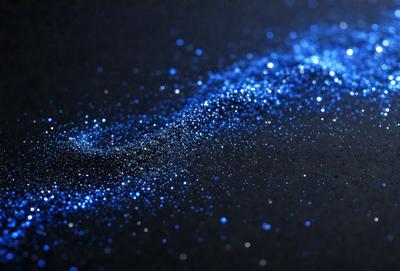 The primary subject of the image is a blue starry background, which appears to be a digital art or illustration. The setting is a black background, and the visual style is a combination of a photo and digital art. The colors and mood of the image are predominantly blue, creating a serene and calming atmosphere.