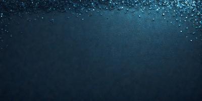 The primary subject of the image is a blue background with a pattern of small blue circles. The setting is a dark blue surface, and the visual style appears to be a digital art or illustration. The dominant colors are blue and black, creating a calm and serene atmosphere.