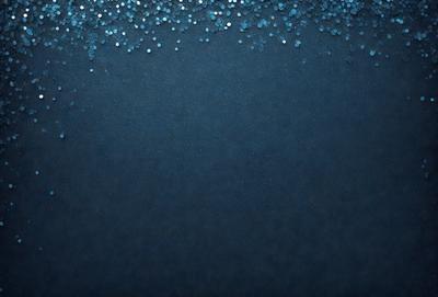 The primary subject of the image is a blue background with a pattern of blue and white glittery dots. The setting is a dark blue background, which creates a contrast with the glittery dots. The visual style is a digital art or illustration, as the glittery dots are created through a digital medium. The colors and mood of the image are predominantly dark blue and glittery, giving it a somewhat mysterious and captivating atmosphere.