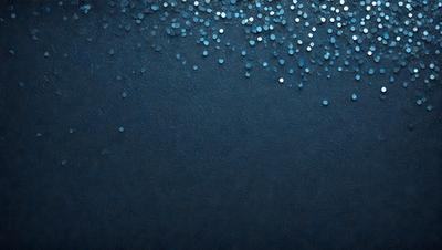 The primary subject of the image is a blue background with a pattern of blue and white dots. The setting is a dark blue background, and the visual style appears to be a digital art or illustration. The colors and mood of the image are predominantly dark and moody, with the blue and white dots creating a visually striking pattern.