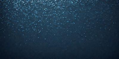 The primary subject of the image is a blue background with a pattern of blue dots. The setting is a dark blue sky, and the visual style appears to be a digital art or illustration. The dominant colors are blue and black, creating a calm and serene atmosphere.