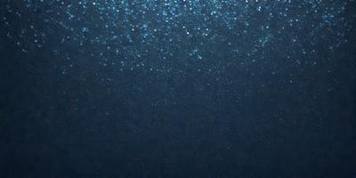 The primary subject of the image is a blue background with a pattern of blue and white stars. The setting is a dark, starry night, and the visual style is a combination of a photo and digital art. The colors and mood of the image are predominantly blue and dark, creating a serene and peaceful atmosphere.