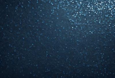 The primary subject of the image is a blue background with a pattern of blue and white stars. The setting is a dark, starry night, and the visual style is a digital art or illustration. The colors and mood of the image are predominantly dark and moody, with the blue and white stars creating a sense of depth and contrast.