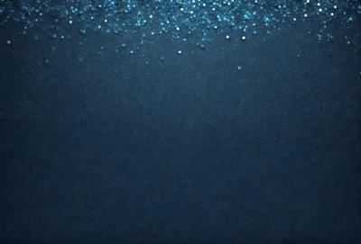 The primary subject of the image is a blue background with a pattern of blue glitter. The setting is a dark blue background, and the visual style is a digital art or illustration. The dominant colors are blue and glitter, creating a calm and serene atmosphere.