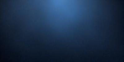 The primary subject of the image is a blue sky with no clouds. The setting is a dark blue background, which creates a contrast with the bright blue sky. The visual style is a photo, capturing the natural beauty of the sky. The colors and mood of the image are predominantly dark and moody, with the blue sky providing a sense of calmness and tranquility.