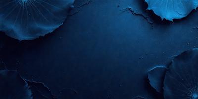 The primary subject of the image is a large, dark blue surface, which appears to be a piece of leather. The setting is a dark room, and the visual style is a close-up of the leather surface. The colors and mood of the image are predominantly dark and moody, with the blue leather providing a striking contrast against the black background.