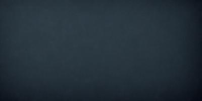 The primary subject of the image is a dark blue background. The setting is a large, empty space with no visible objects or people. The visual style is a simple, monochromatic design. The colors and mood are predominantly dark and moody, with a hint of mystery.