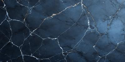 The primary subject of the image is a close-up of a marble wall with a blue tint. The setting is a dark room, and the visual style appears to be a photo. The dominant colors are blue and black, creating a moody atmosphere.