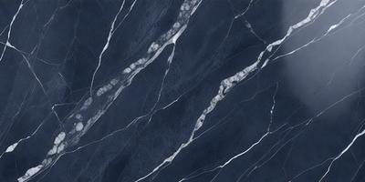 The primary subject of the image is a blue marble tile with a pattern of white streaks. The setting is a wall, and the visual style is a close-up of the tile. The colors and mood of the image are predominantly blue and white, creating a clean and elegant appearance.