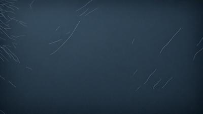The primary subject of the image is a blue sky with a few white clouds. The setting is a dark blue background, which creates a contrasting effect with the white clouds. The visual style is a combination of a photo and digital art, as it appears to be a photo of a painting or drawing. The colors and mood of the image are predominantly dark and moody, with the blue sky and white clouds adding a touch of brightness to the overall atmosphere.