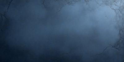The primary subject of the image is a blue sky with a few clouds. The setting is a dark, cloudy sky, which creates a moody atmosphere. The visual style is a photo, capturing the natural beauty of the sky. The colors and mood are predominantly dark and dramatic, with the blue sky and clouds providing a sense of depth and contrast.