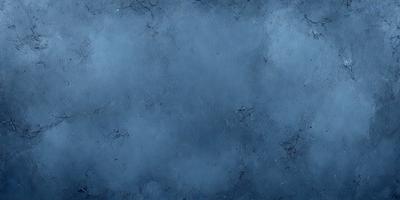 The primary subject of the image is a blue sky with clouds. The setting is a cloudy sky, and the visual style is a photo. The dominant colors are blue and white, creating a calm and serene atmosphere.