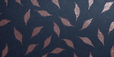 The primary subject of the image is a pattern of leaves, which are the main objects in the scene. The setting is a dark blue background, which creates a moody atmosphere. The visual style is a combination of photo and digital art, as the leaves are depicted in a detailed and intricate manner. The colors are predominantly dark blue and brown, with the leaves being the main focus of the image.