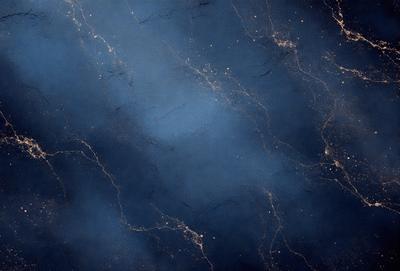 The primary subject of the image is a blue marble wall with a pattern of light and dark streaks. The setting is a dark room, and the visual style appears to be a photo. The dominant colors are blue and black, creating a moody atmosphere.