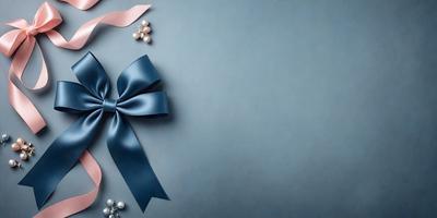 The primary subject of the image is a blue bow, which is prominently displayed in the foreground. The setting is a blue wall, which serves as the background for the bow. The visual style is a close-up of the bow, emphasizing its details. The colors and mood of the image are predominantly blue, creating a calm and serene atmosphere.