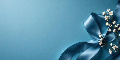 The primary subject of the image is a blue ribbon. The ribbon is prominently displayed in the foreground, covering a significant portion of the image. The setting is a blue background, which complements the blue ribbon and creates a cohesive visual style. The overall atmosphere is calm and serene, with the blue ribbon being the main focus of the image.