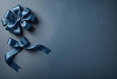 The primary subject of the image is a blue bow, which is prominently displayed against a blue background. The visual style of the image is a photo, and the colors and mood convey a sense of calmness and tranquility.