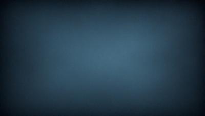 The primary subject of the image is a blue background. The setting is a dark, empty space with no visible objects or people. The visual style is a simple, monochromatic design. The colors and mood are predominantly dark and moody, with the blue background creating a sense of depth and mystery.