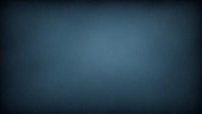 The primary subject of the image is a blue background. The setting is a dark, empty space with no visible objects or people. The visual style is a simple, monochromatic design. The colors and mood are predominantly dark and moody, with the blue background creating a sense of depth and mystery.