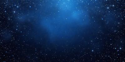 The primary subject of the image is the night sky filled with stars. The setting is a dark, star-filled sky, and the visual style is a photo of the night sky. The colors and mood of the image are predominantly dark and serene, with the stars providing a sense of wonder and tranquility.