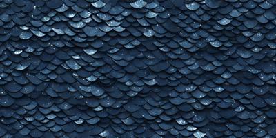 The primary subject of the image is a blue and black patterned surface, which appears to be a textured wallpaper or a piece of artwork. The setting is a dark room, and the visual style is a close-up of the patterned surface. The colors and mood of the image are predominantly dark and moody, with the blue and black colors creating a sense of depth and intrigue.