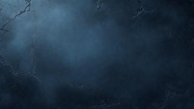 The primary subject of the image is a blue wall with a textured surface. The setting is a dark room, and the visual style appears to be a photo. The dominant colors are blue and black, creating a moody atmosphere.