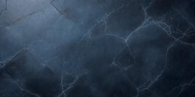 The primary subject of the image is a close-up of a blue surface, possibly a wall or a piece of fabric. The setting appears to be a dark room, with the blue surface being the main focus. The visual style of the image is a close-up, which emphasizes the blue color and texture of the surface. The overall atmosphere of the image is moody and dramatic, with the blue surface serving as the main point of interest.