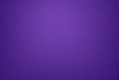 Purple background with no visible objects or textures.