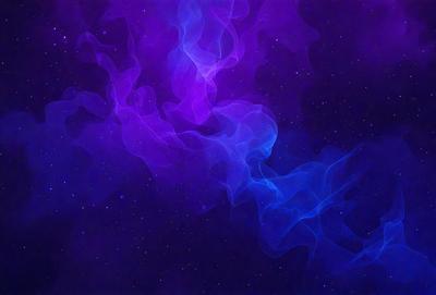 The primary subject of the image is a purple and blue nebula, which is a cloud of gas and dust in space. The setting is a dark, star-filled sky, with the nebula as the main focus. The visual style is a digital art or illustration, creating a vibrant and colorful scene. The dominant colors are purple and blue, giving the image a serene and celestial atmosphere.