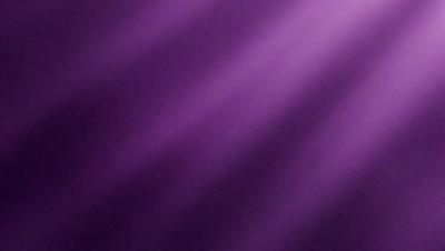 Purple light shining on a purple background.