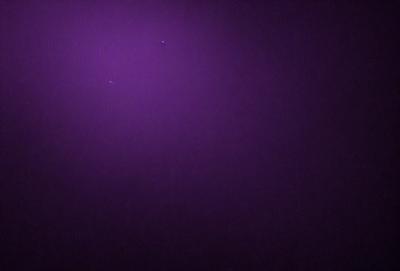 Purple background with a star pattern.