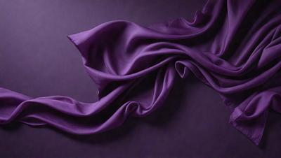 The primary subject of the image is a purple fabric, which is the main object, scene, or focus of the image. The setting is a dark background, which contrasts with the purple fabric. The visual style is a close-up of the purple fabric, showcasing its texture and details. The colors and mood of the image are predominantly purple, creating a calm and serene atmosphere.