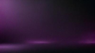 The primary subject of the image is a purple background, which creates a unique and striking visual effect. The setting or background is a dark, foggy environment, which adds to the overall atmosphere of the image. The visual style of the image is a combination of photo and digital art, as it appears to be a photo with a purple tint, giving it a distinctive and artistic appearance. The colors and mood of the image are predominantly purple, which evokes a sense of mystery and intrigue.
