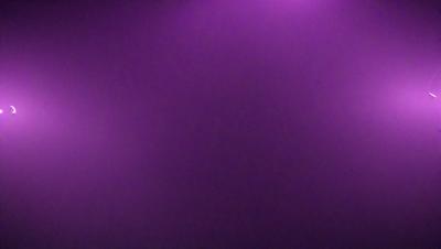 Purple background with a purple light source.