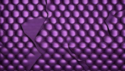 The primary subject of the image is a purple fabric with a pattern of round circles. The setting is a close-up of the fabric, showcasing its unique design. The visual style is a close-up of the fabric, which gives a detailed view of the pattern. The colors and mood of the image are predominantly purple, creating a calm and soothing atmosphere.